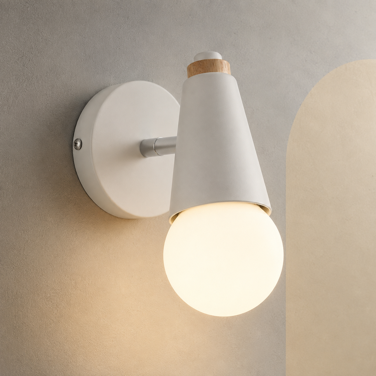 White exposed bulb wall sconce lit on a stone wall with cream arch