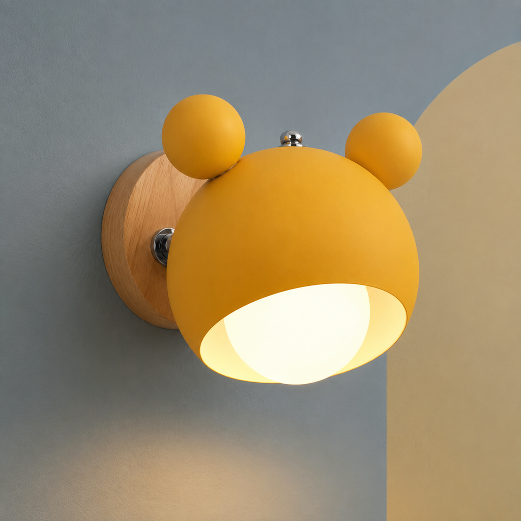 Yellow kids wall light lit on a slate blue wall with butter arch