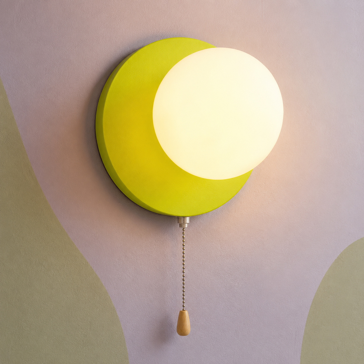 Chartreuse green disc globe wall sconce lit warm with pull chain switch