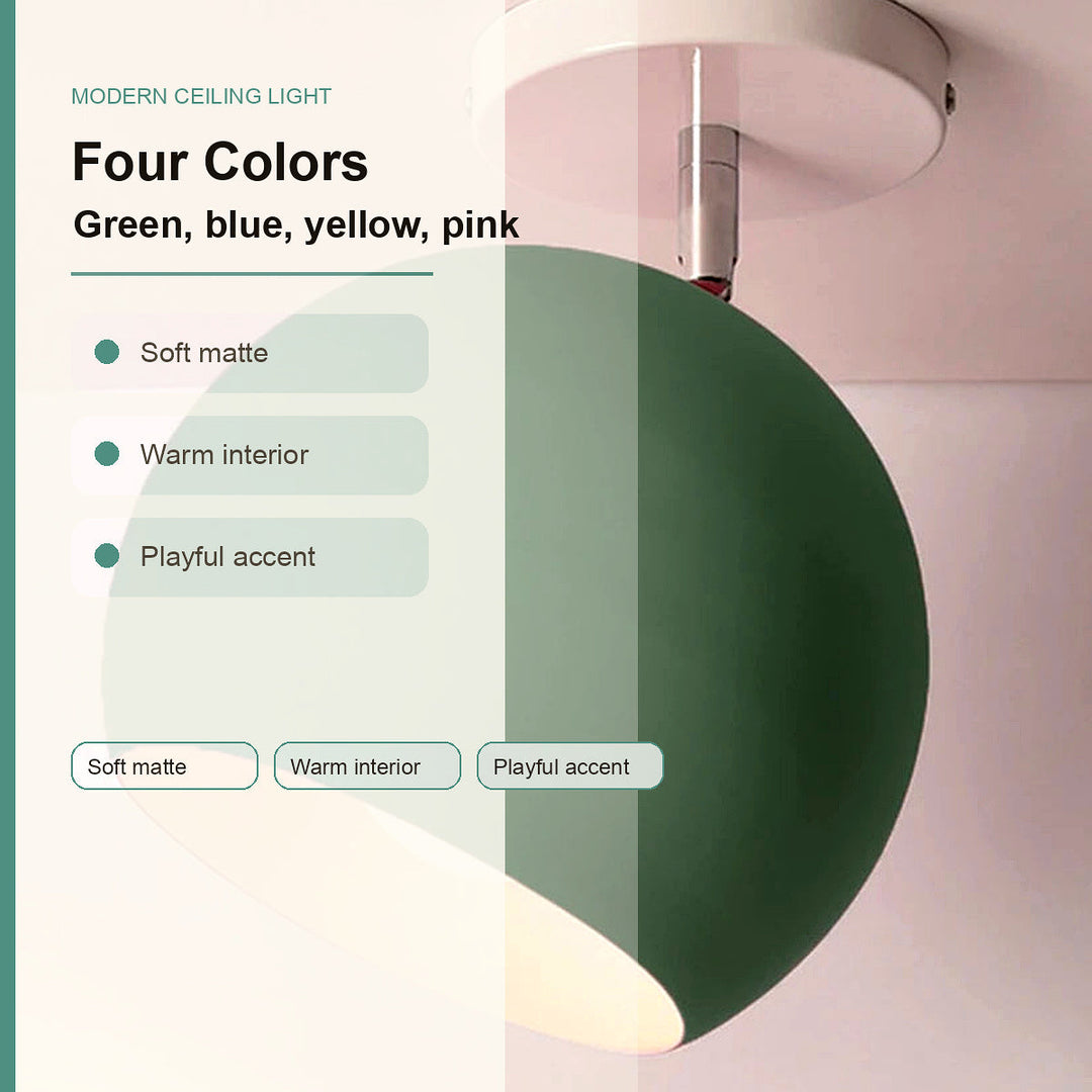 Modern ceiling light with a large spherical shade in a soft matte green finish, shown against a pale pink wall with overlaid text listing color options and features.