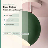 Modern ceiling light with a large spherical shade in a soft matte green finish, shown against a pale pink wall with overlaid text listing color options and features.