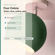 Modern ceiling light with a large spherical shade in a soft matte green finish, shown against a pale pink wall with overlaid text listing color options and features.