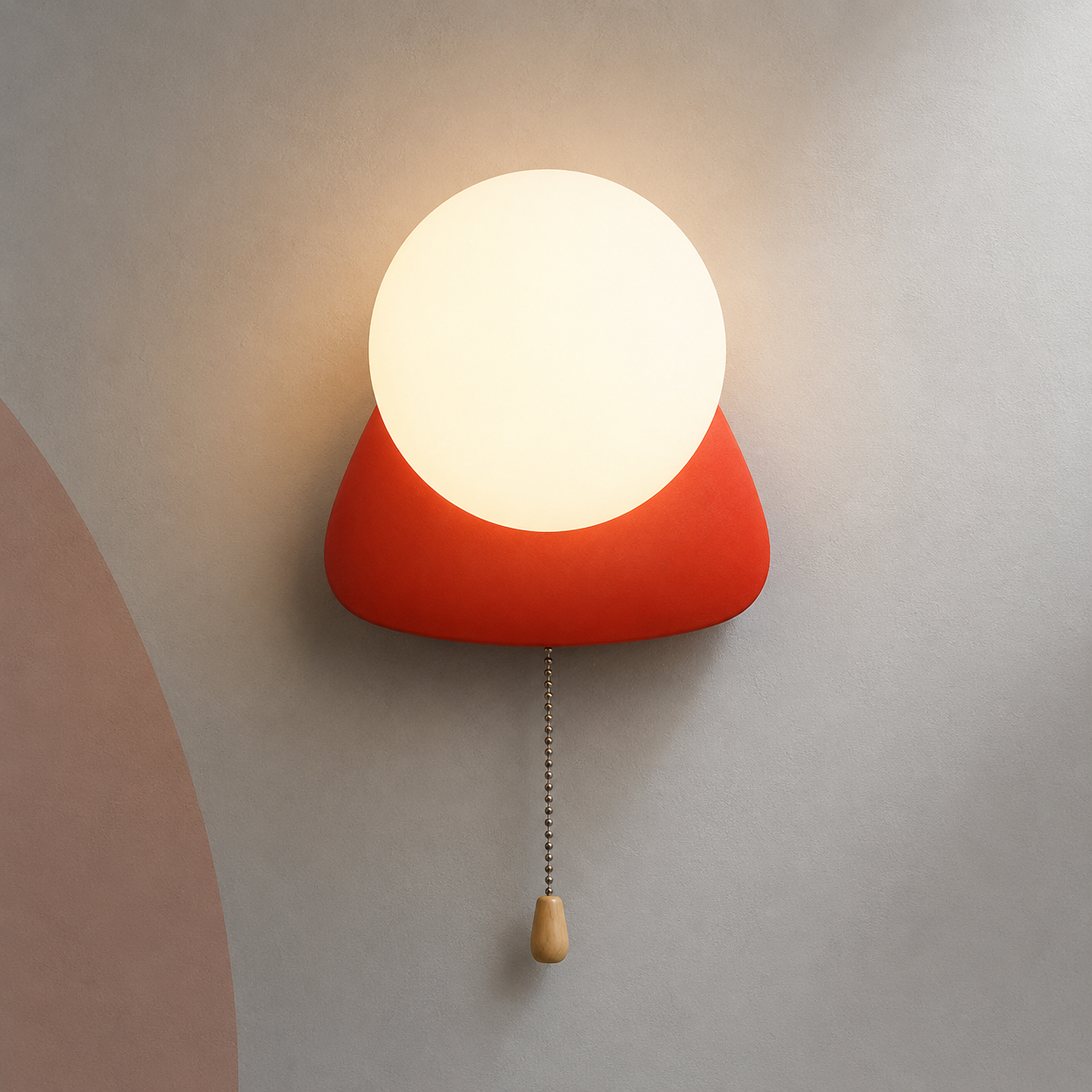 Coral red pebble globe wall sconce lit warm with pull chain switch