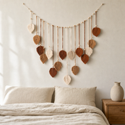 Beaded Cord Wall Garland, 120 cm, Leaf or Tassel Ends hung on the wall above a bed