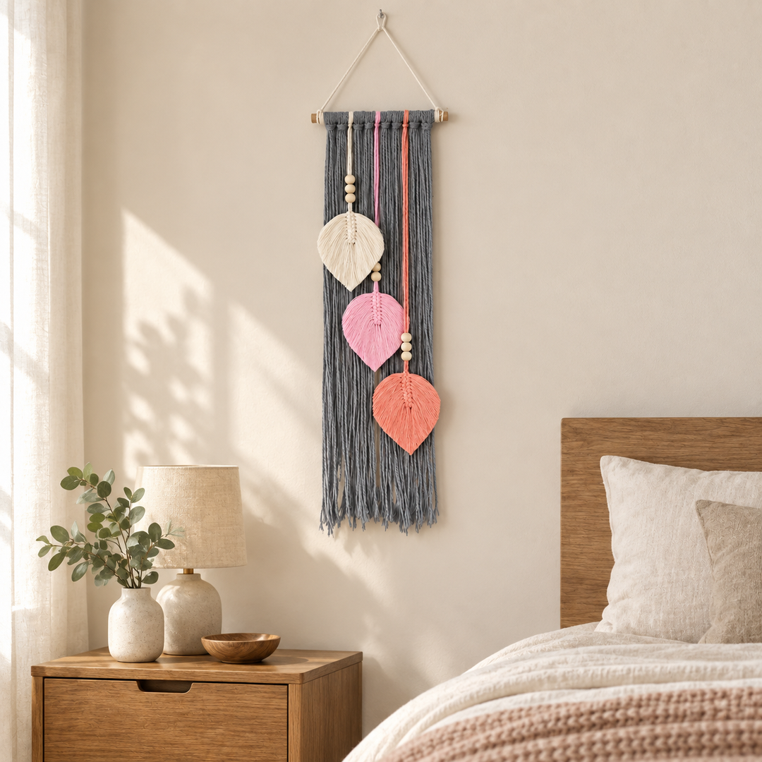 Bedroom accent wall beside a bed and nightstand, macrame leaf trio