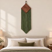 Boutique hotel bedroom above a bed, wood diamond over a narrow chevron fringe