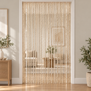 Silver strands held in a hand, shimmer string door curtain, polyester fiber with a metallic thread, per the supplier's own