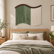 Bedroom above a bed, color block fringe curtain, twisted cord, dark stained wave-cut board