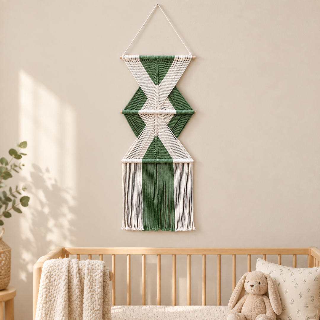 Nursery accent wall beside a cot, stacked hourglass tiers, twisted cord, short pale dowels