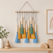 Nursery wall above a shelf with wooden toys, small beaded tassel row on a dowel