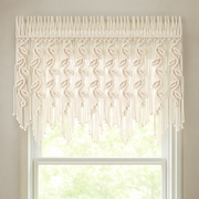 Macrame Leaf Valance, 110 x 55 cm, With or Without Rod hung across a window with daylight behind it