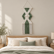 Bedroom above a headboard, stacked hourglass tiers, twisted cord, short pale dowels