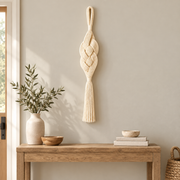 Entry accent wall beside a console, braided rope wall pendant