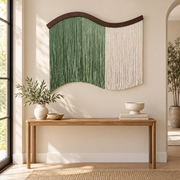 Entryway above a console, color block fringe curtain, twisted cord, dark stained wave-cut board