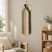 Nursery reading corner beside a bookcase, fanned hoop with fringe