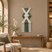 Green macrame wall hanging above a wooden bench in a hotel style lounge