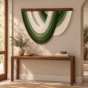 Open fan fringe wall hanging above a wooden console in an entryway