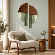 Split circle wall decor beside wood slat panelling above an armchair