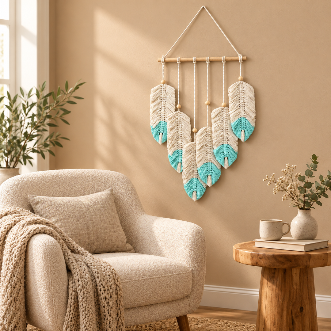 Macrame feather cluster above a boucle armchair in a reading nook