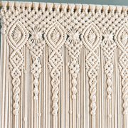 Macro of the diamond and rosette knotwork releasing into cords