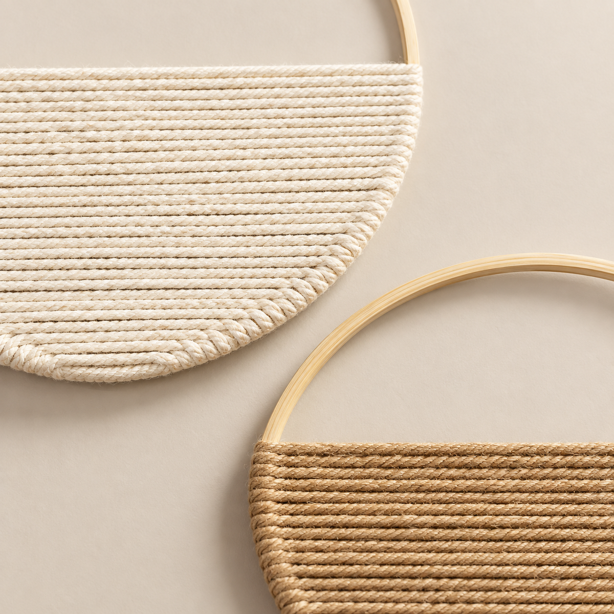 Macro of the cream and tan wound faces meeting their rings, set of 2 woven half moon hoops, 19 cm