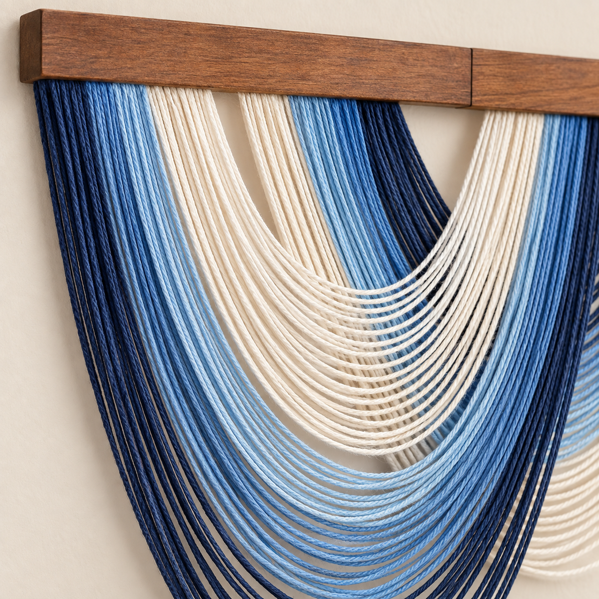 Macro of the blue swags meeting the rod, graded swag fan in four colorways