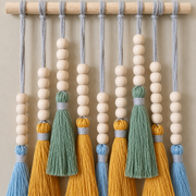 Macro of the bead stacks and the green, mustard and blue tassel heads