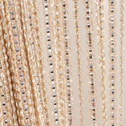 Orange strands held in a hand, shimmer string door curtain, polyester fiber with a metallic thread, per the supplier's own