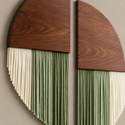 Macro of the wood grain and the cream-to-green fringe, split circle set of 2 in wood and fringe