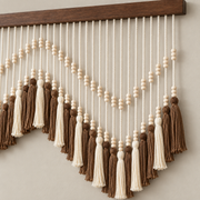 Macro of the bead zigzag and the brown and cream tassel heads
