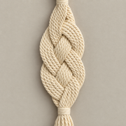 Macro of the braid and its two open bulges, braided rope wall pendant