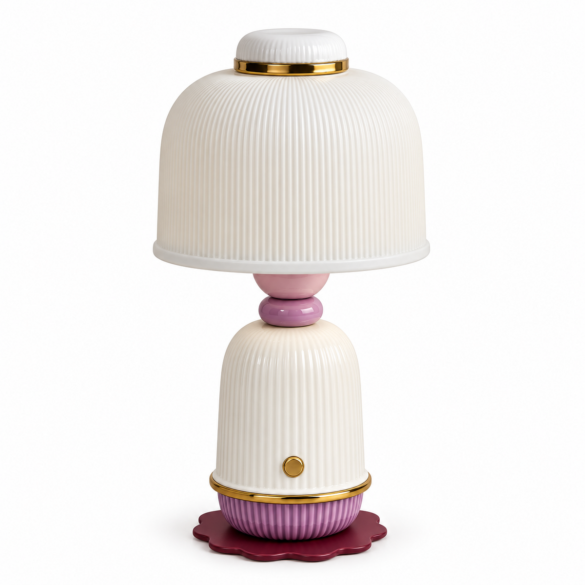 A decorative table lamp with a ribbed white shade and base, accented with gold trim, a pink neck, a purple base ring, and a scalloped dark purple footplate, shown on a white background.