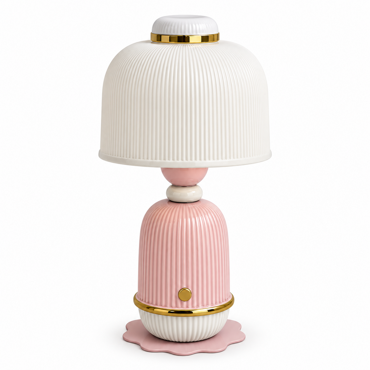 A decorative table lamp with a ribbed white dome shade, a pink ribbed base, and gold metallic accents, shown on a plain white background.