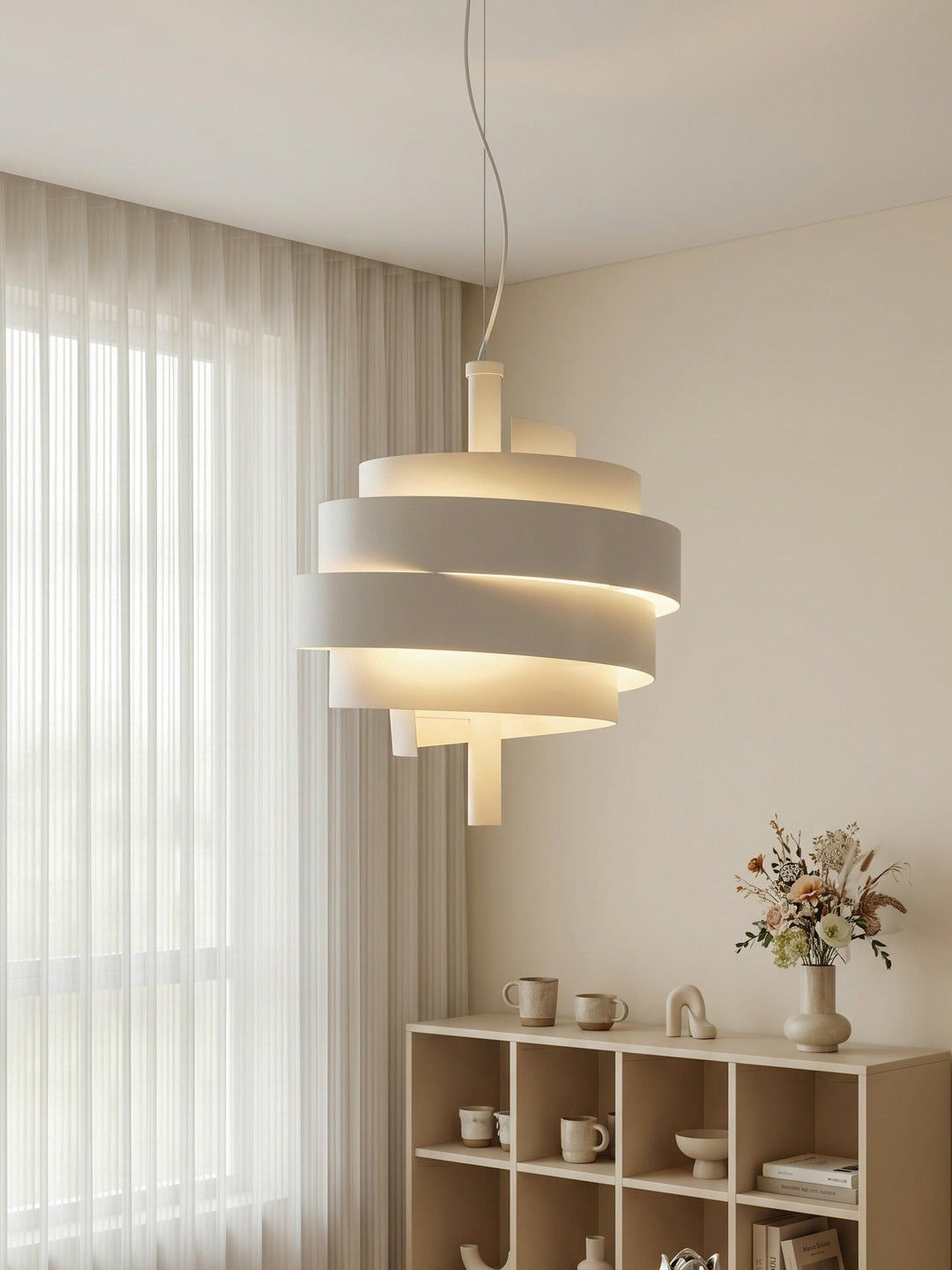 Modern pendant light hanging in a room with a window and shelf.