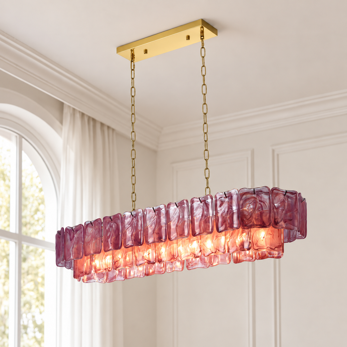 An illuminated purple glass linear chandelier hangs from gold-toned chains and a matching canopy beside an arched window.
