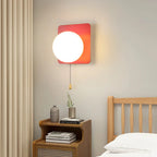 Globe pull chain wall sconce - supplier photo 03: scene C Red bedside