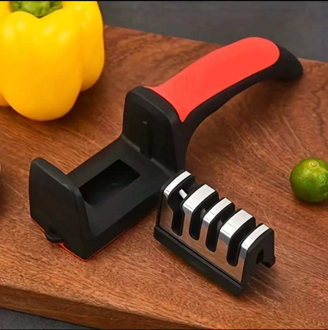 Pull-through knife sharpener on a counter, side view showing the sharpening slots