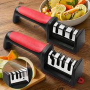 Kitchen knife sharpener with non-slip base on a clean wooden counter