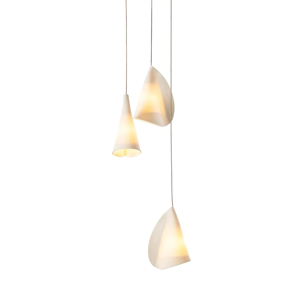 Chandelier with three folded white porcelain shades viewed from another angle against a white background.