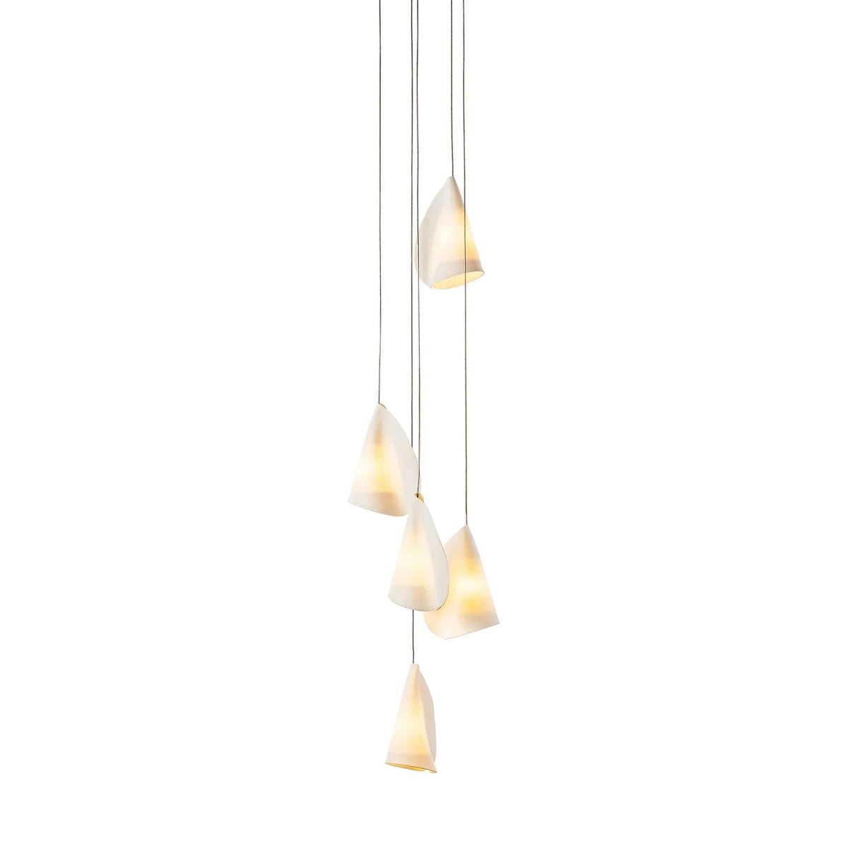 Chandelier with five glowing white porcelain shades hanging in a long staggered arrangement against a white background.