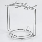 One empty silver smooth-wire cup-and-saucer rack.