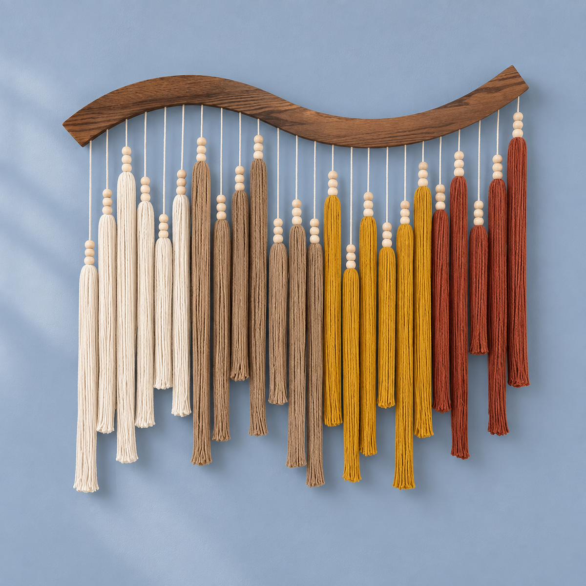 A2 autumn studio on blue, beaded tassel wave pole, dark stained wave-cut wood pole, twisted cord tassels