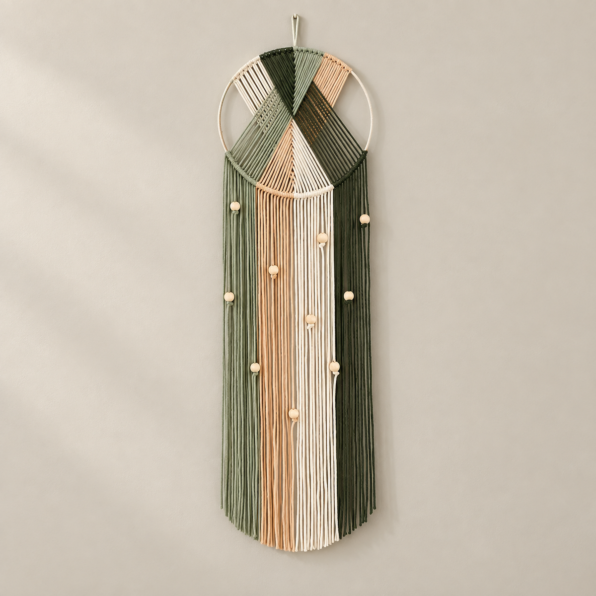 Olive, sage and peach chevron wound over a hoop above a beaded cream panel