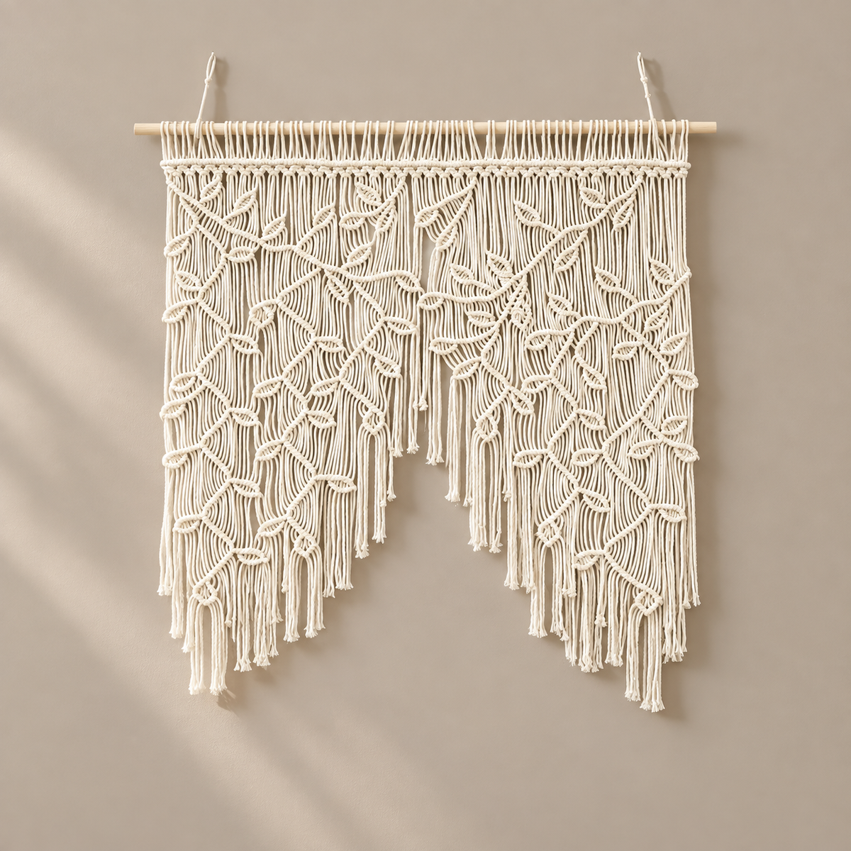 Studio on cream, knotted leaf panel, twisted cord, pale wooden dowel