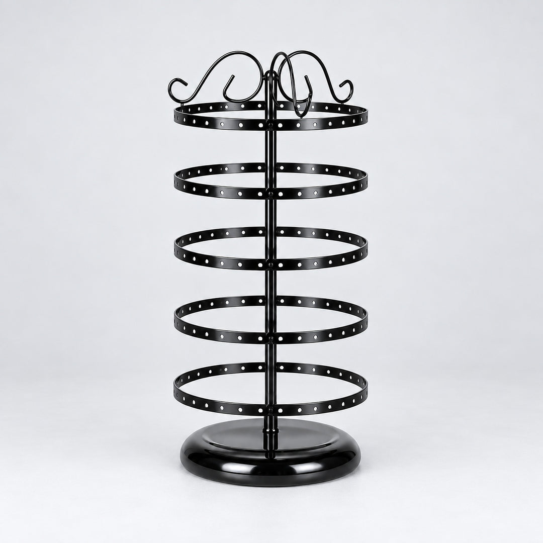 Empty black five-tier jewelry stand with domed circular black pedestal.