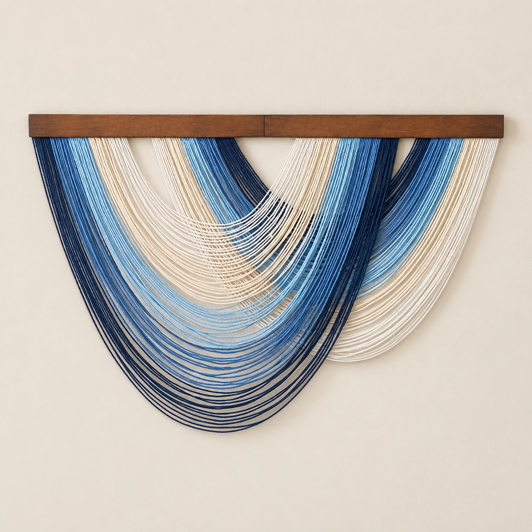 Blue studio on cream, graded swag fan in four colorways, fine twisted cord, stained wood rod