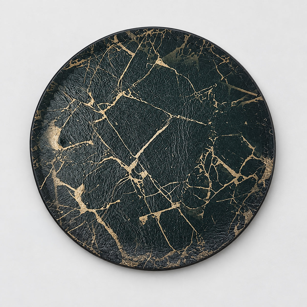 One Black and Gold artificial-leather coaster, 10 cm.
