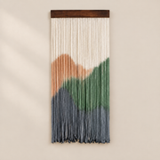 Dip dyed cord wall hanging with cream sky, terracotta peak, green ridge and slate