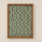 Three frames above a bed with a swatch strip of all thirteen styles