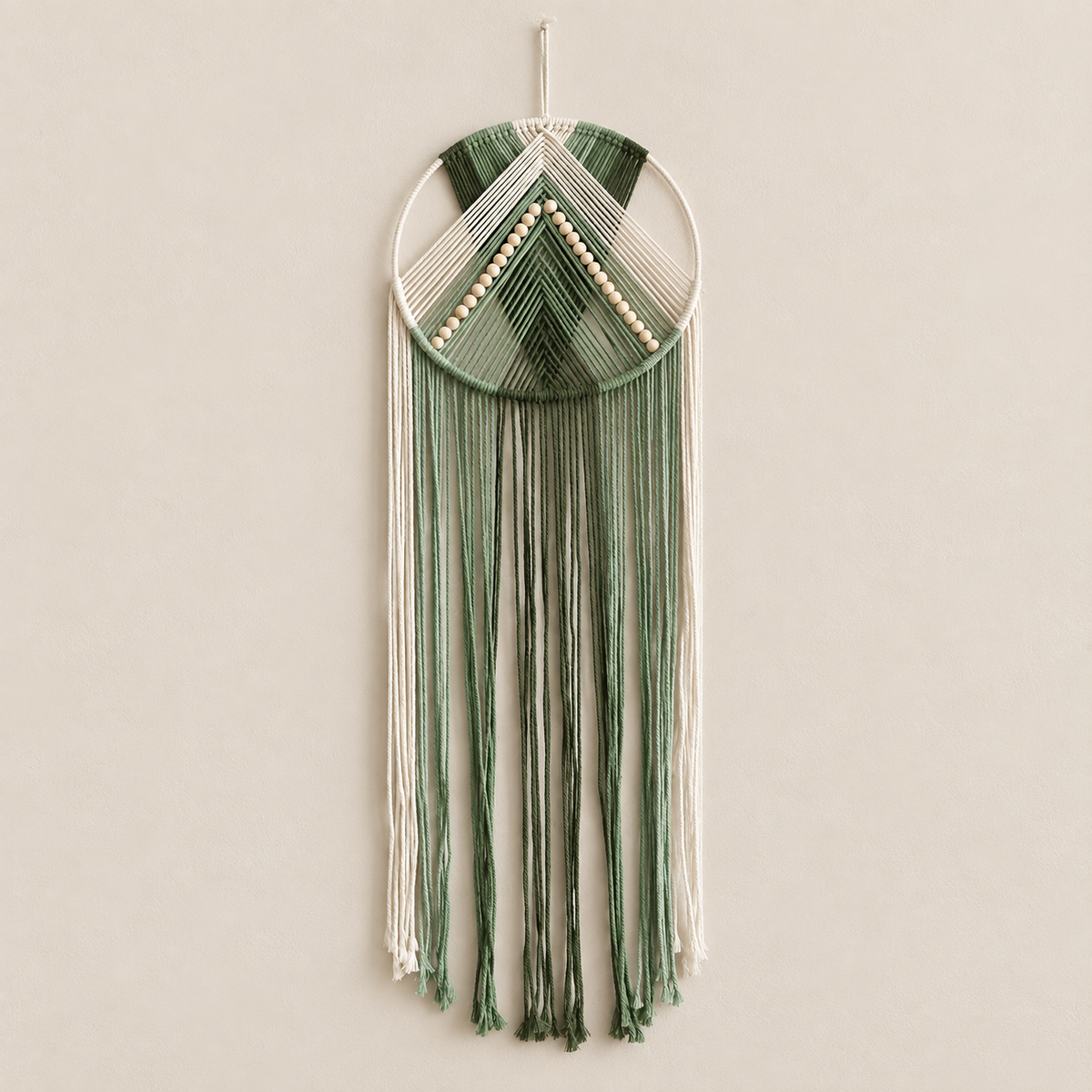 Green option studio on cream, beaded hoop with chevron and fringe